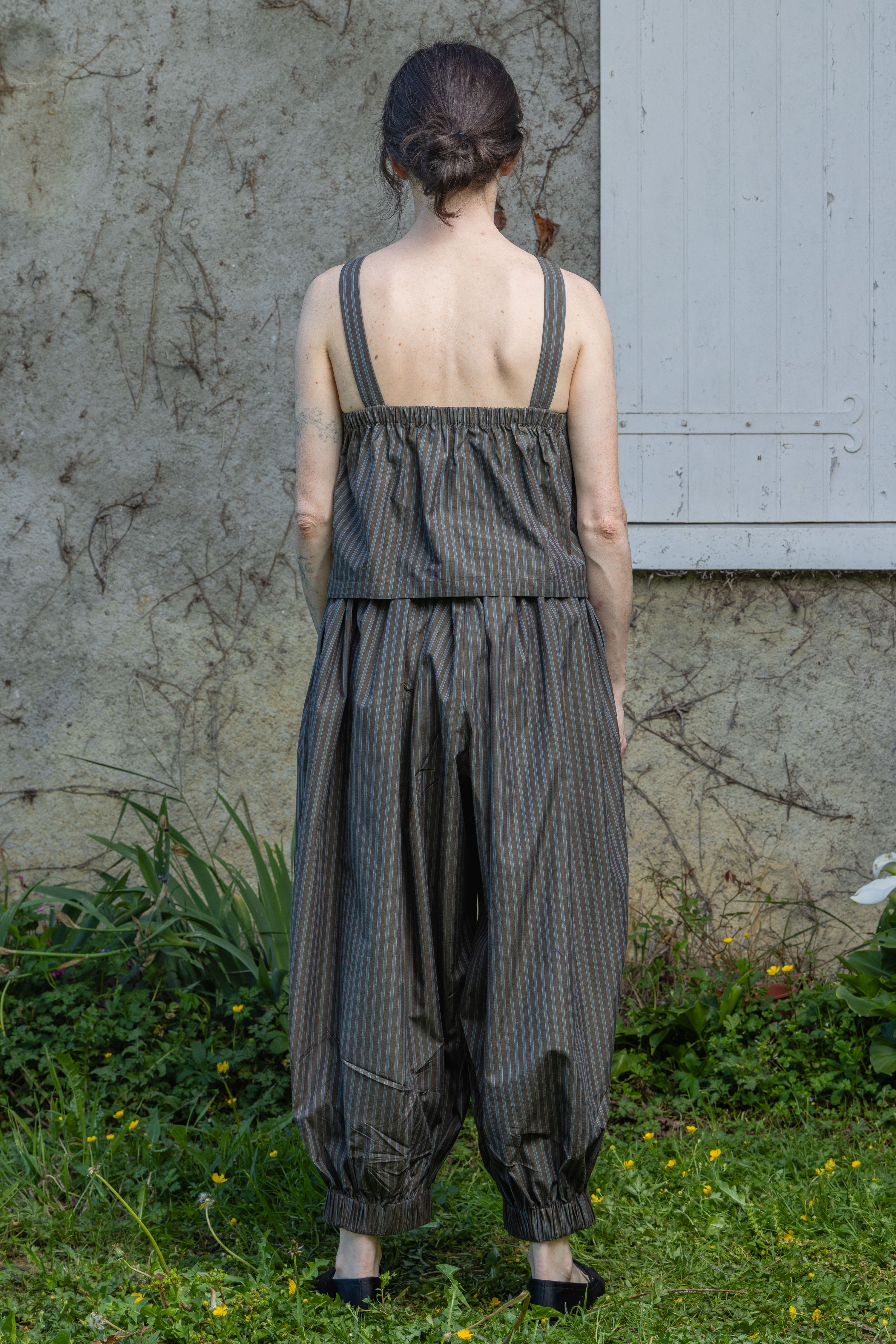 Olive stripe sleeveless tank top with wide back straps and gathered waist hem