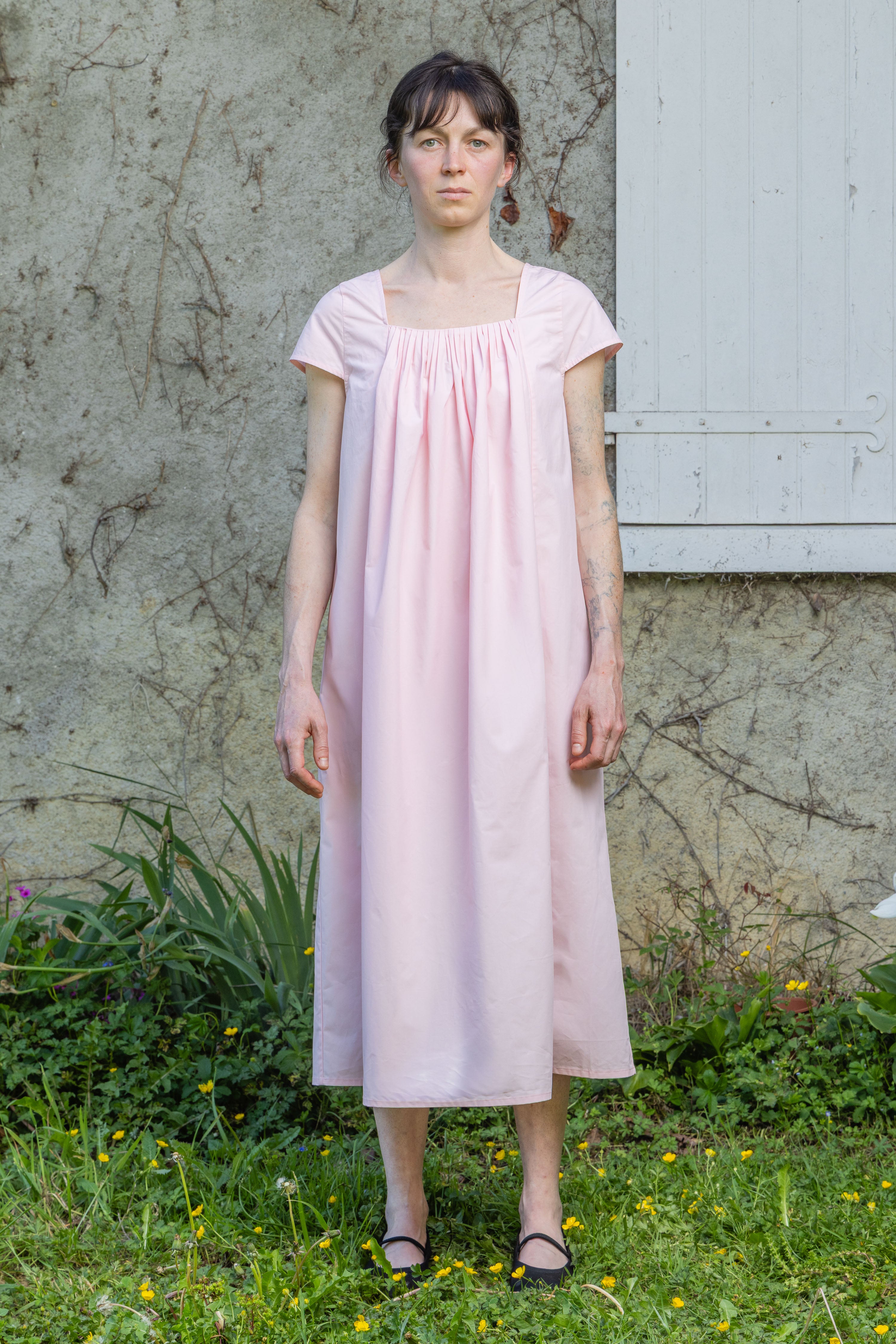 Pink Hier dress with gathered neckline and short sleeves, front view, knee-length