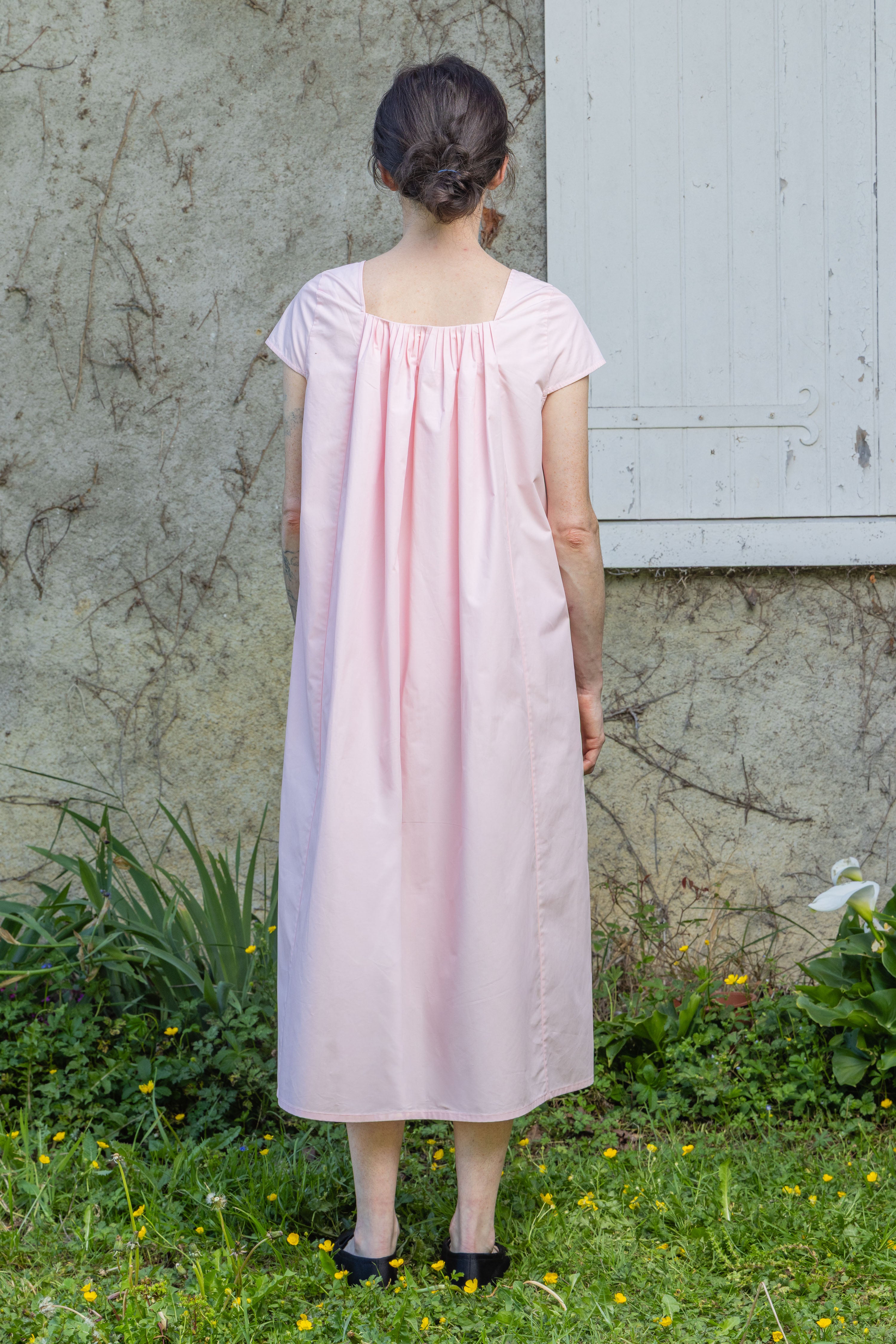 Pink Hier dress, back view with gathered yoke and short cap sleeves