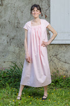 Pink Hier dress with pleated gathered bodice and short sleeves, front view