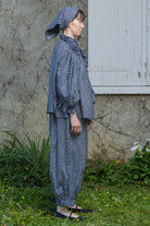 Navy floral peasant top with gathered high neck and long balloon sleeves