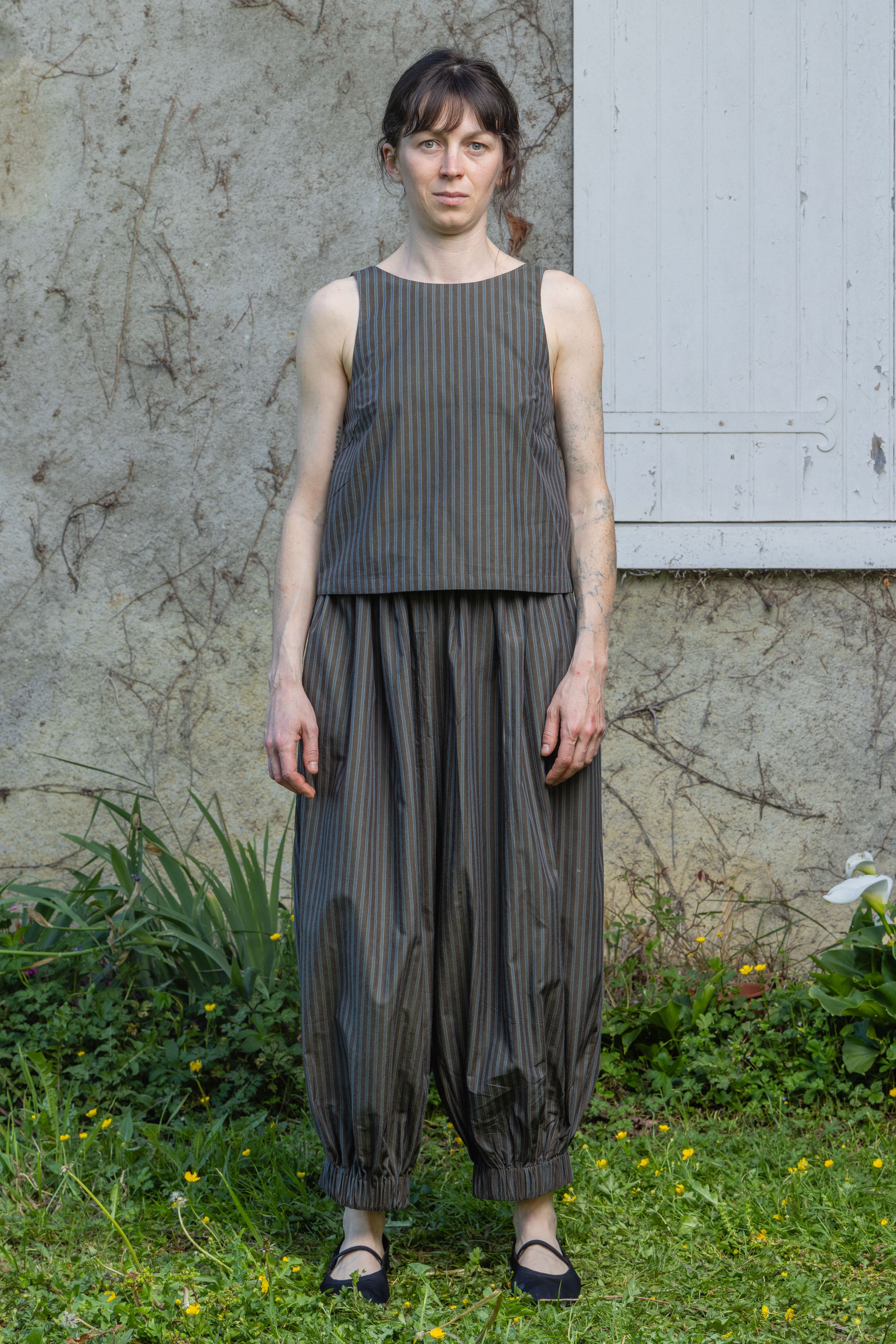 Olive stripe sleeveless tank top with rounded neck and gathered hem