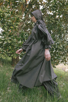 Olive striped midi dress with ruffled high collar and puff sleeves, gathered waist.
